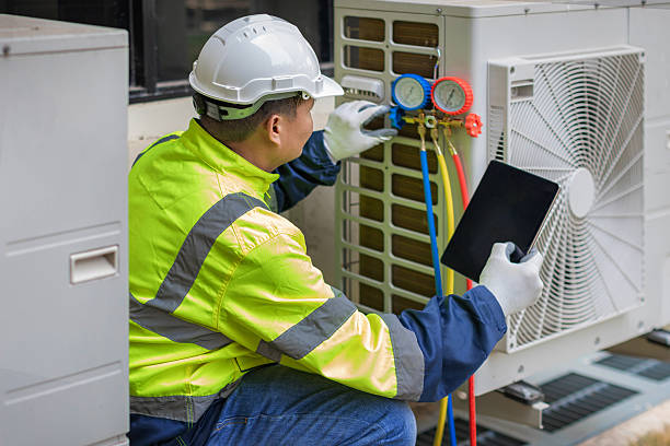 Professional Hvac technician working in Helenville, WI